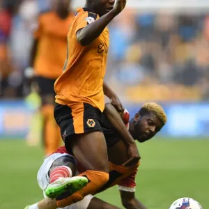 A Fight for Possession: Wolves vs Newport County in the Capital One Cup