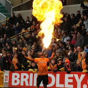 Fire-Breathing Mascots Ignite the Barclays Premier League Atmosphere: Wolves vs. Bolton Wanderers