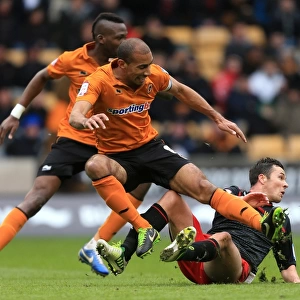Henry vs. Cowie: Intense Rivalry in Wolverhampton Wanderers vs. Cardiff City Npower Championship Clash (24-02-2013)
