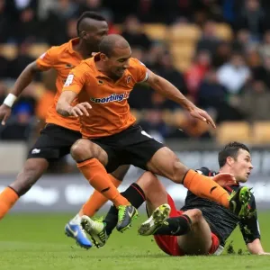 Henry vs. Cowie: Intense Rivalry in Wolverhampton Wanderers vs. Cardiff City Npower Championship Clash (24-02-2013) Henry vs. Cowie: Intense Rivalry in Wolverhampton Wanderers vs. Cardiff City Npower Championship Clash (24-02-2013)
