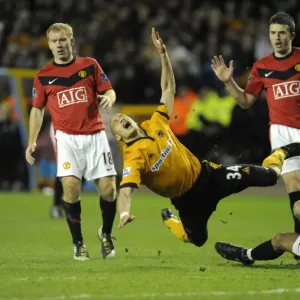 Intense Barclays Premier League Clash: Guedioura Fouls Vidic (Wolverhampton Wanderers vs Manchester United, 2010) Intense Barclays Premier League Clash: Guedioura Fouls Vidic (Wolverhampton Wanderers vs Manchester United, 2010)
