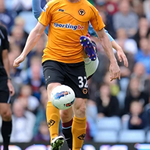 Intense Battle: Barry Bannan vs. Kevin Foley - Aston Villa vs. Wolverhampton Wanderers (Premier League Soccer)