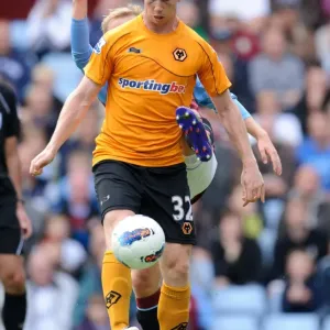 Intense Battle: Barry Bannan vs. Kevin Foley - Aston Villa vs. Wolverhampton Wanderers (Premier League Soccer) Intense Battle: Barry Bannan vs. Kevin Foley - Aston Villa vs. Wolverhampton Wanderers (Premier League Soccer)