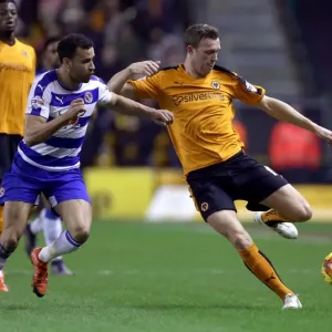 Intense Battle for Championship Supremacy: Wolverhampton Wanderers vs. Reading - Wolves Kevin McDonald vs. Hal Robson-Kanu Intense Battle for Championship Supremacy: Wolverhampton Wanderers vs. Reading - Wolves Kevin McDonald vs. Hal Robson-Kanu