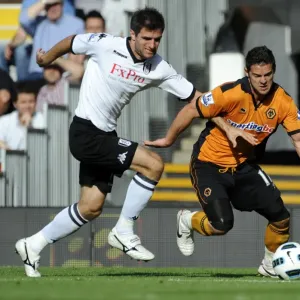Intense Battle: Matt Jarvis vs Aaron Hughes - Fulham vs Wolverhampton Wanderers in the Barclays Premier League Intense Battle: Matt Jarvis vs Aaron Hughes - Fulham vs Wolverhampton Wanderers in the Barclays Premier League