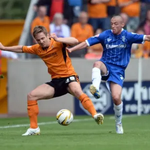 Intense Battle for Possession: Wolverhampton Wanderers vs. Gillingham