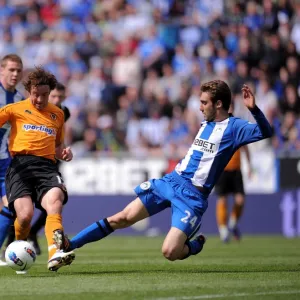 Intense Clash: Wolverhampton Wanderers vs. Wigan Athletic in Barclays Premier League