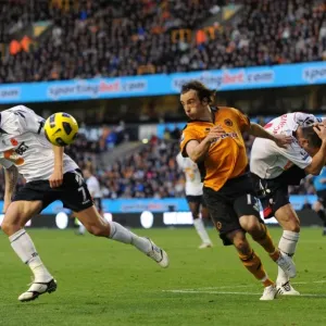 Intense Face-off: Stephen Hunt vs. Matthew Taylor and Paul Robinson of Bolton Wanderers (Wolverhampton Wanderers vs. Bolton Wanderers) Intense Face-off: Stephen Hunt vs. Matthew Taylor and Paul Robinson of Bolton Wanderers (Wolverhampton Wanderers vs. Bolton Wanderers)