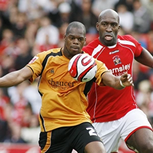 Intense Rivalry: Harewood vs Moore Clash at Barnsley vs Wolverhampton Wanderers Championship Match, 2009