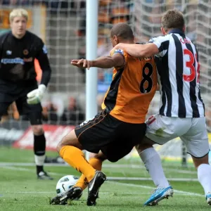 Intense Rivalry: Henry vs. Cox Clash in Wolverhampton Wanderers vs. West Bromwich Albion Barclays Premier League Match Intense Rivalry: Henry vs. Cox Clash in Wolverhampton Wanderers vs. West Bromwich Albion Barclays Premier League Match