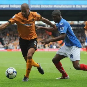 Intense Rivalry: Henry vs. Sowah Clash in Portsmouth vs. Wolverhampton Premier League Showdown Intense Rivalry: Henry vs. Sowah Clash in Portsmouth vs. Wolverhampton Premier League Showdown