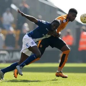 Intense Rivalry: Maghoma vs. Hause in Wolves vs. Birmingham City Championship Clash