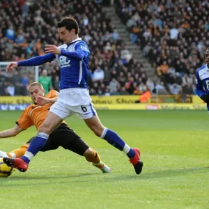 Intense Rivalry: Michael Kightly's Slide Tackle on Liam Ridgewell (Wolverhampton Wanderers vs Birmingham City, Premier League) Intense Rivalry: Michael Kightly's Slide Tackle on Liam Ridgewell (Wolverhampton Wanderers vs Birmingham City, Premier League)