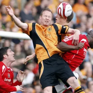 Intense Rivalry: Moore, Craddock, and Berra's Clash between Barnsley and Wolverhampton Wanderers in the 2009 Championship Battle Intense Rivalry: Moore, Craddock, and Berra's Clash between Barnsley and Wolverhampton Wanderers in the 2009 Championship Battle