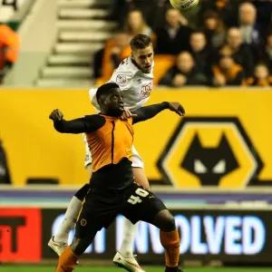 Intense Rivalry: Wolves vs. Derby County - A Battle for Championship Supremacy: Dicko vs. Albentosa