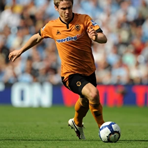 Kevin Doyle at City of Manchester Stadium: A Determined Moment for Wolverhampton Wanderers Against Manchester City (Premier League, 22/08/09)