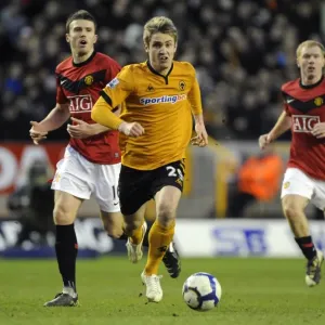 Kevin Doyle's Thrilling Action: Wolverhampton Wanderers vs Manchester United (Premier League Clash, 2010) Kevin Doyle's Thrilling Action: Wolverhampton Wanderers vs Manchester United (Premier League Clash, 2010)