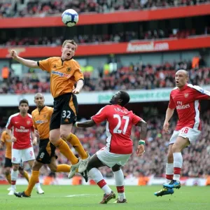 Kevin Foley Climbs Above Emmanuel Eboue Print Kevin Foley Climbs Above Emmanuel Eboue Print