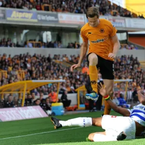 Leaping Over the Challenge: Stearman's Aerial Victory in Wolves vs. QPR (Premier League Soccer)