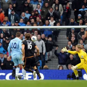 Manchester City Takes Early Lead over Wolverhampton Wanderers: Edin Dzeko Scores