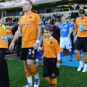 Mascot Showdown: Wolves vs. Wigan Athletic - Premier League Battle