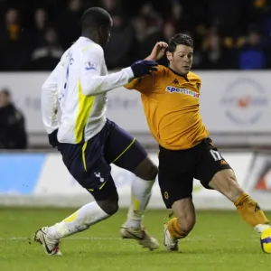 Matt Jarvis vs. Sebastien Bassong: A Premier League Showdown at Wolverhampton Wanderers vs. Tottenham Hotspur