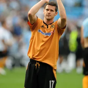 Matthew Jarvis Faces Manchester City: A Determined Moment at City of Manchester Stadium (Wolverhampton Wanderers vs Manchester City)