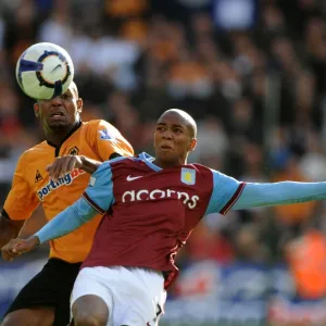 Midlands Rivalry: Ashley Young vs. Ronald Zubar Clash in Premier League Soccer - Wolves vs. Aston Villa