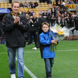 A Nostalgic Encounter: Young Wolves Fan Pays Tribute to Paul Birch at Wolves vs. Aston Villa A Nostalgic Encounter: Young Wolves Fan Pays Tribute to Paul Birch at Wolves vs. Aston Villa