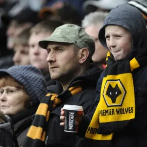 Passionate Wolverhampton Wanderers FC Fans in Action: Bolton Wanderers vs. Wolverhampton Wanderers, Barclays Premier League Passionate Wolverhampton Wanderers FC Fans in Action: Bolton Wanderers vs. Wolverhampton Wanderers, Barclays Premier League
