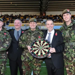 Phil Taylor Honors Armed Forces at Molineux: A Unique Football-Darts Crossover - Wolverhampton Wanderers vs Bolton Wanderers Phil Taylor Honors Armed Forces at Molineux: A Unique Football-Darts Crossover - Wolverhampton Wanderers vs Bolton Wanderers