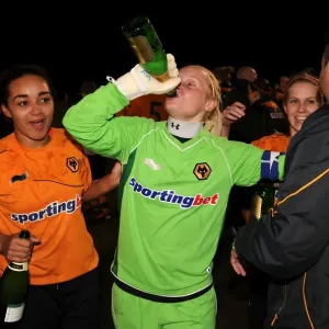 Players from Wolves Women celebrate after becoming Champions of the Midland Womens Combination League