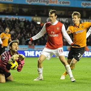 Premier League Showdown: Fabianski Saves at the Feet of Doyle - Wolverhampton Wanderers vs. Arsenal