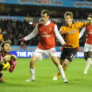 Premier League Showdown: Fabianski Saves at the Feet of Doyle - Wolverhampton Wanderers vs. Arsenal