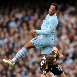 Premier League Showdown: Lescott vs. Doyle - Manchester City vs. Wolverhampton Wanderers