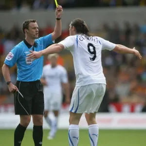 Referee Stuart Attwell Issues Yellow Card to Andrew Carroll in Wolverhampton Wanderers vs Newcastle United Referee Stuart Attwell Issues Yellow Card to Andrew Carroll in Wolverhampton Wanderers vs Newcastle United