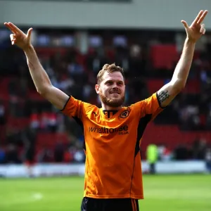 Richard Stearman's Triumphant Celebration: Wolverhampton Wanderers Claim Sky Bet League One Victory over Leyton Orient Richard Stearman's Triumphant Celebration: Wolverhampton Wanderers Claim Sky Bet League One Victory over Leyton Orient