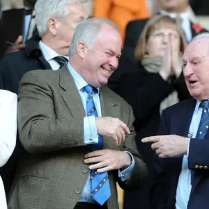 Sir Jack Hayward and Jonathan Hayward: A Father-Son Moment of Laughter at Wolves vs. Wigan Athletic in the Premier League