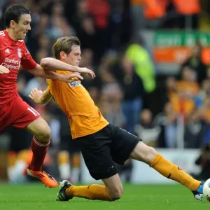 Stearman vs Downing: A Premier League Showdown - Intense Rivalry between Wolverhampton Wanderers Richard Stearman and Liverpool's Stewart Downing Stearman vs Downing: A Premier League Showdown - Intense Rivalry between Wolverhampton Wanderers Richard Stearman and Liverpool's Stewart Downing