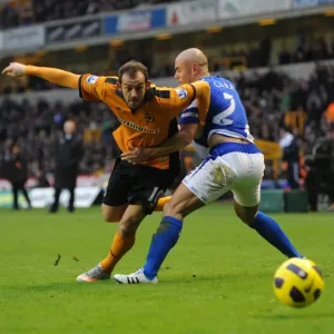 Steven Fletcher vs. Stephen Carr: A Battle in the Black Country Derby - Wolverhampton Wanderers vs. Birmingham City, Barclays Premier League: Intense Rivalry on the Football Field