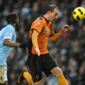 Steven Fletcher's Battle for Glory: Manchester City vs. Wolverhampton Wanderers in the Barclays Premier League