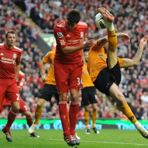 Steven Fletcher's Determined Shot at Goal for Wolverhampton Wanderers Against Liverpool (Barclays Premier League)