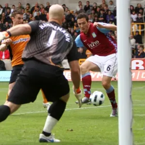 Stuart Downing Scores the Opener: Aston Villa Takes Early Lead over Wolverhampton Wanderers in Premier League