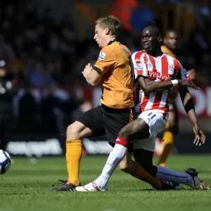 A Tense Clash: Berra vs Sidibe in the Barclays Premier League - Wolverhampton Wanderers vs Stoke City (April 11, 2010)