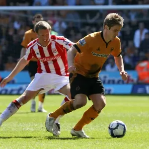 A Tense Clash: Collins vs. Doyle in the Barclays Premier League - Wolverhampton Wanderers vs. Stoke City (11-04-10)