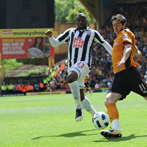 A Tense Moment in the Barclays Premier League: Stephen Ward vs. Abdoulaye Meite - Wolverhampton Wanderers vs. West Bromwich Albion