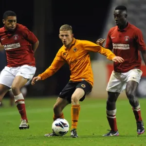 Tense Showdown: Holmes-Dennis vs. Sho-Silva in FA Youth Cup Clash at Molineux (Wolverhampton Wanderers U18 vs Charlton Athletic U18)