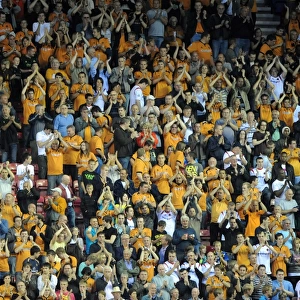 Four Thousand Strong: Wolverhampton Wanderers' Unwavering Support at Wigan Athletic's DW Stadium (BPL: Wigan Athletic vs Wolves, August 18, 2009)