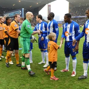Thrilling Mascot Showdown: Wolverhampton Wanderers vs Wigan Athletic - Barclays Premier League