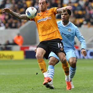 Wolverhampton Wanderers Fletcher Stands Firm Against Manchester City: A Battle for the Ball
